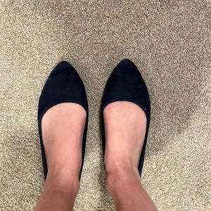 Navy blue flats.